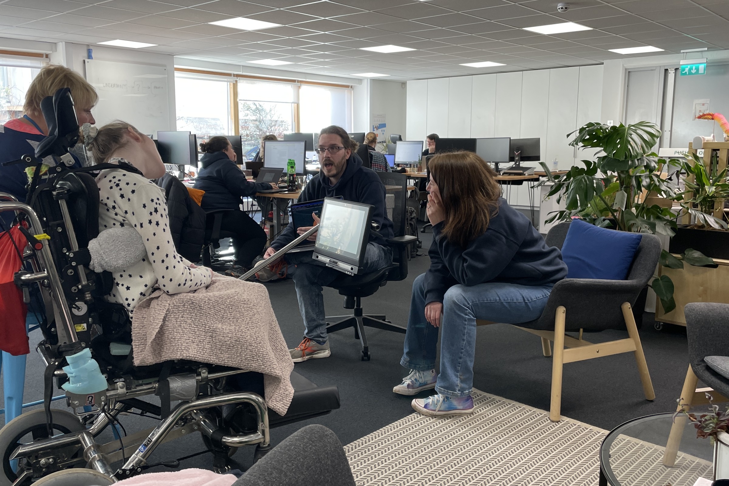 Hannah trying out our new eye gaze activities in the Bristol office.