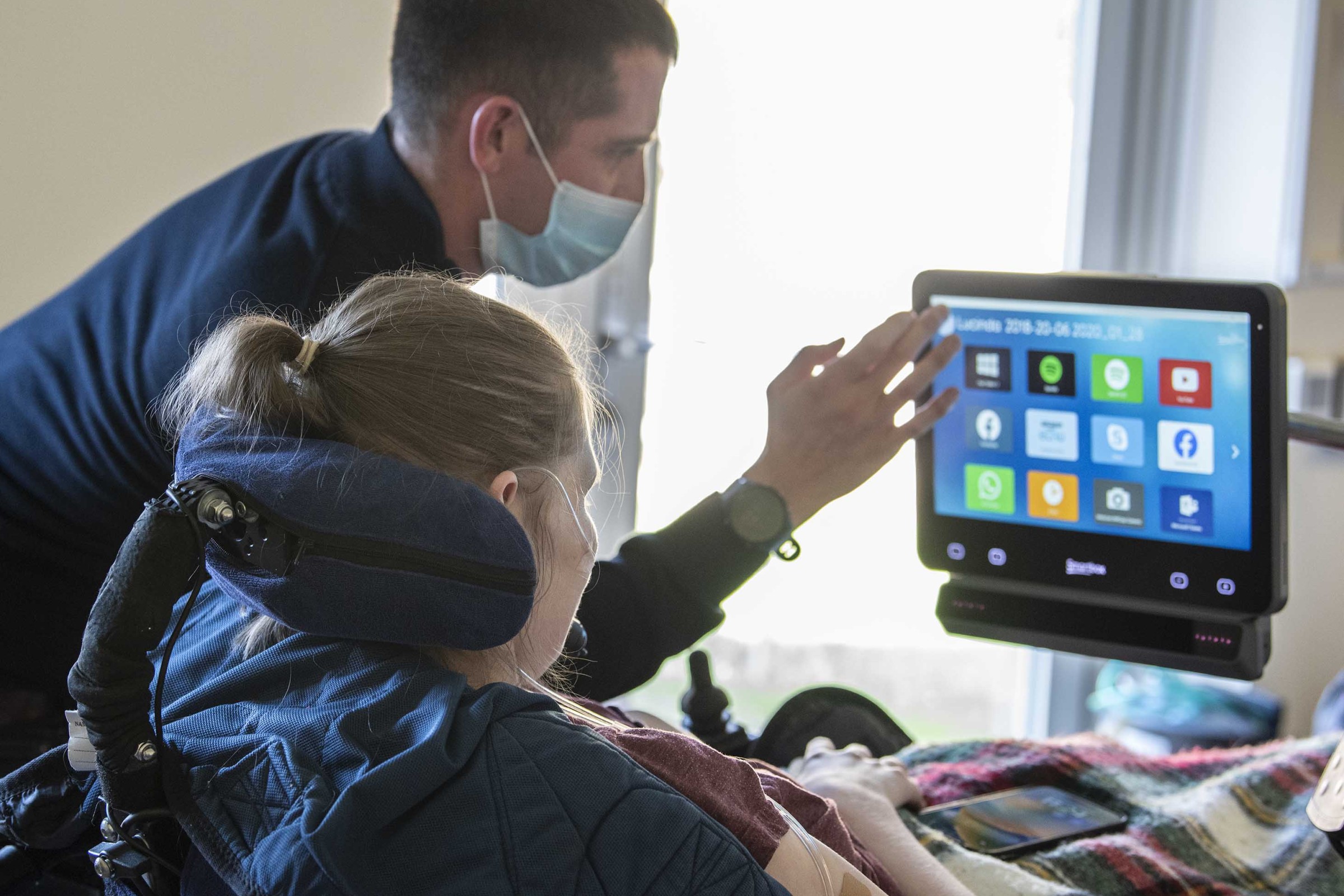 Lucinda using eye gaze with Jay, AT Specialist