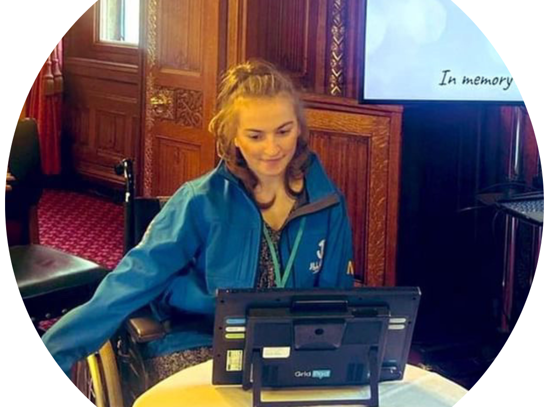 AAC user Ellise with her Grid Pad.