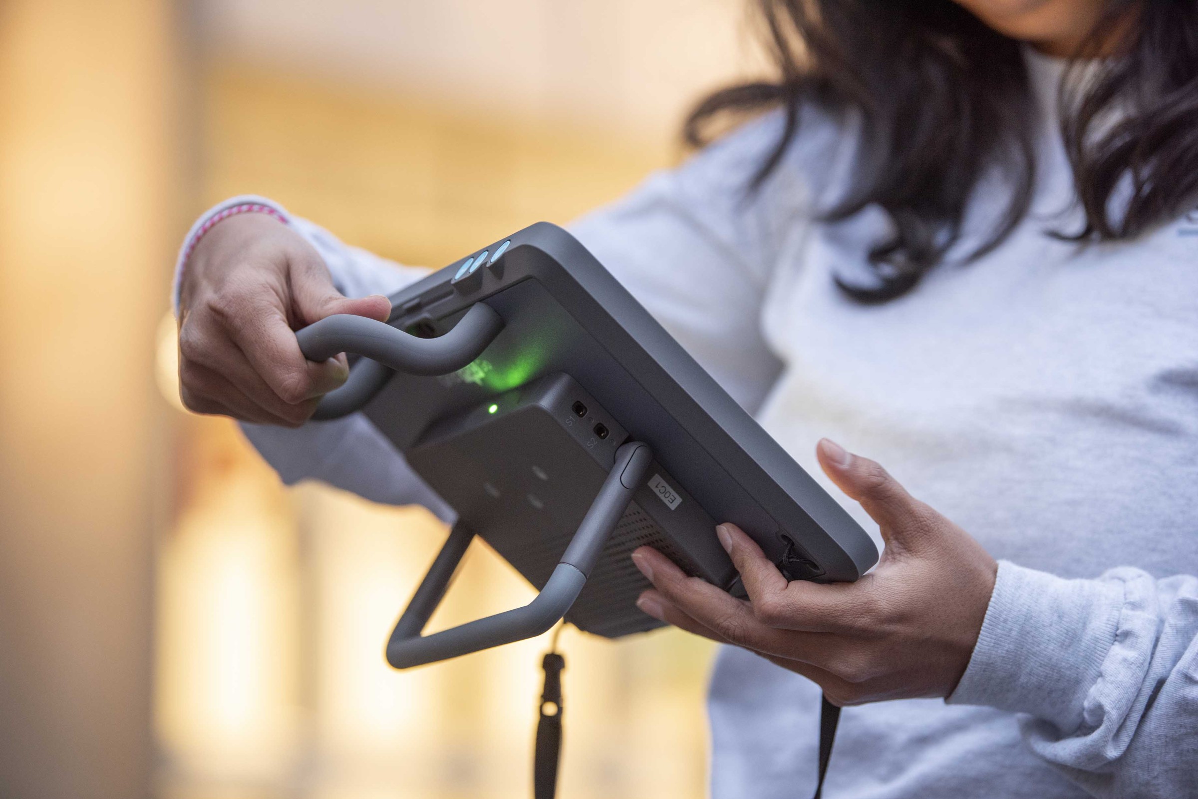 Someone holding the Grid Pad Go